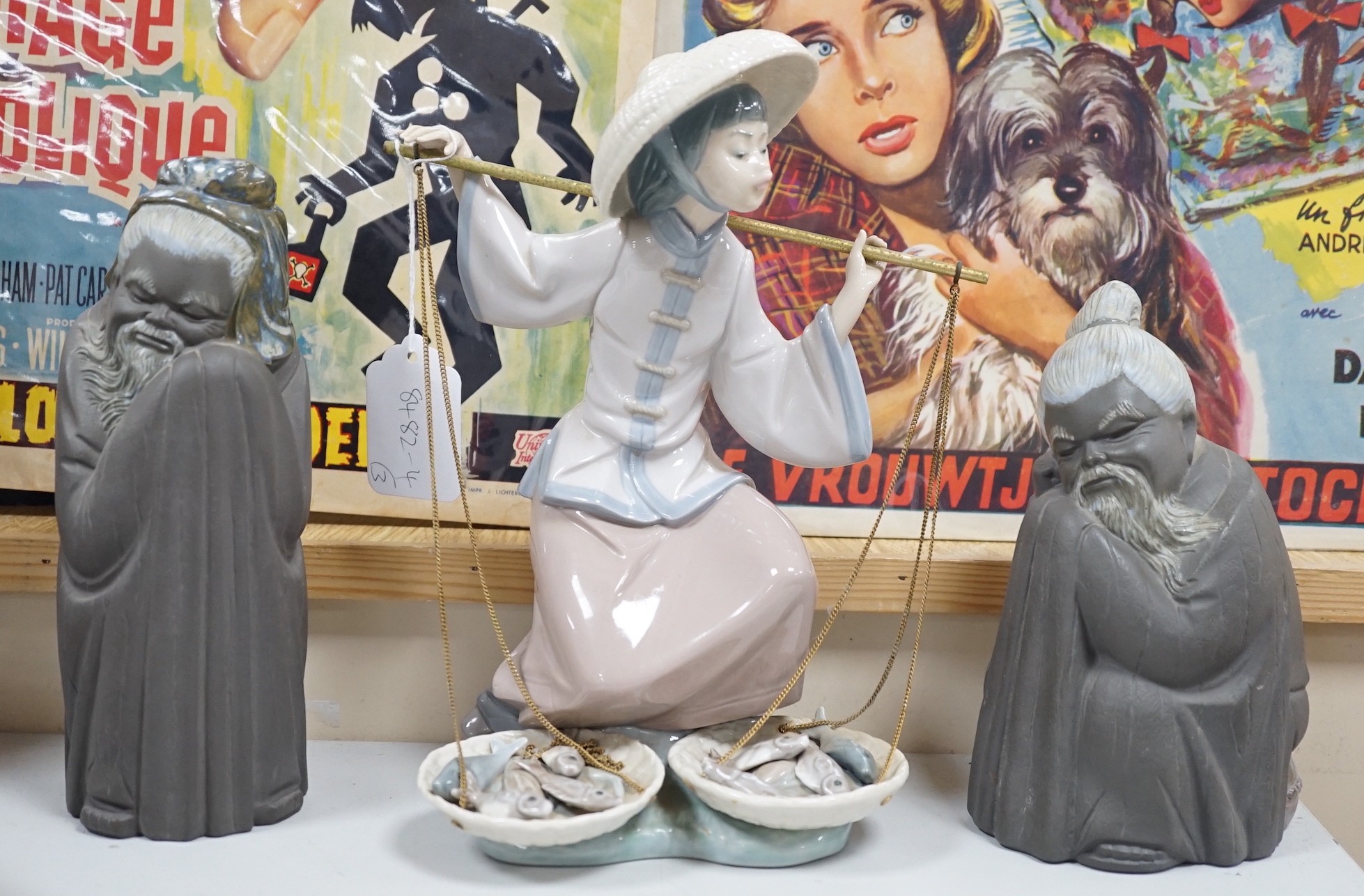 Three Lladro figures, 25cms high